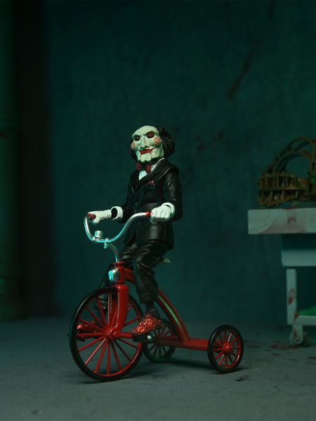 SAW – ULTIMATE JIGSAW KILLER (RED ROBE) – 7″ SCALE ACTION FIGURE